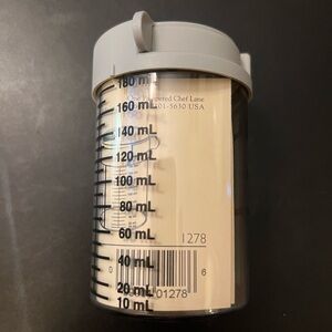 The Pampered Chef Clear The grate container and Gray Lid